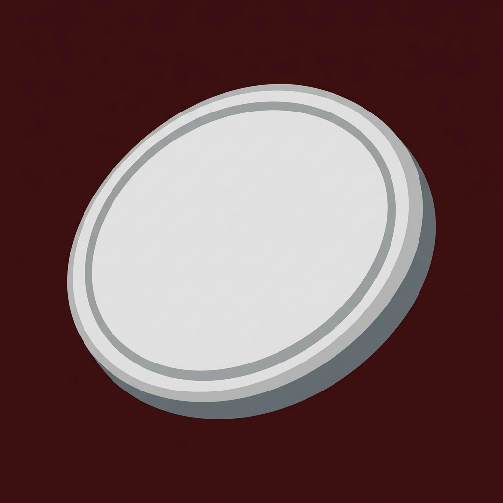A blank nickel-coloured mill, struck with nothing